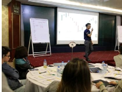 Thomas presenting at a seminar